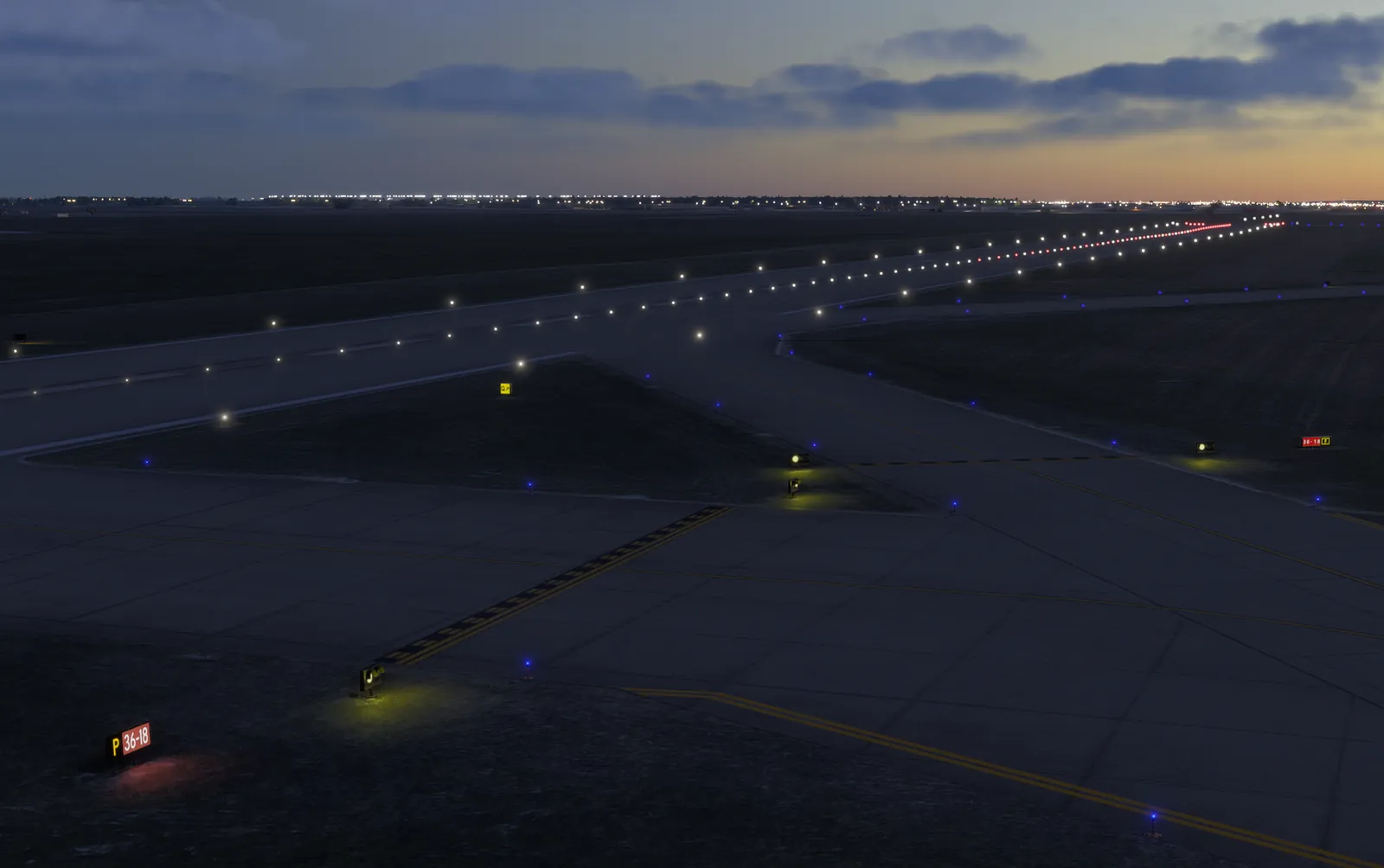 Taxiway and runway lighting at dusk